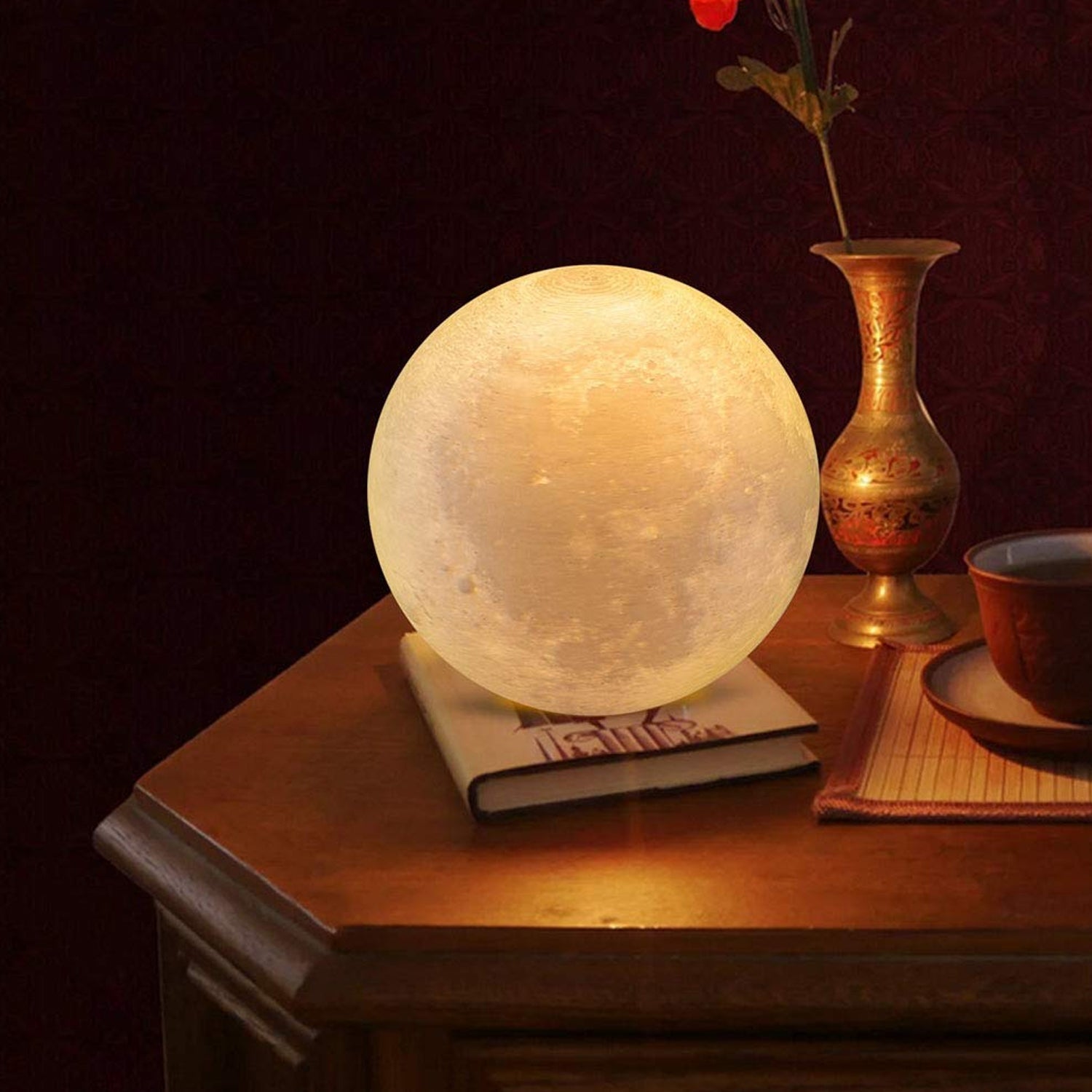 3D printed moon lamp with stand and USB charging.