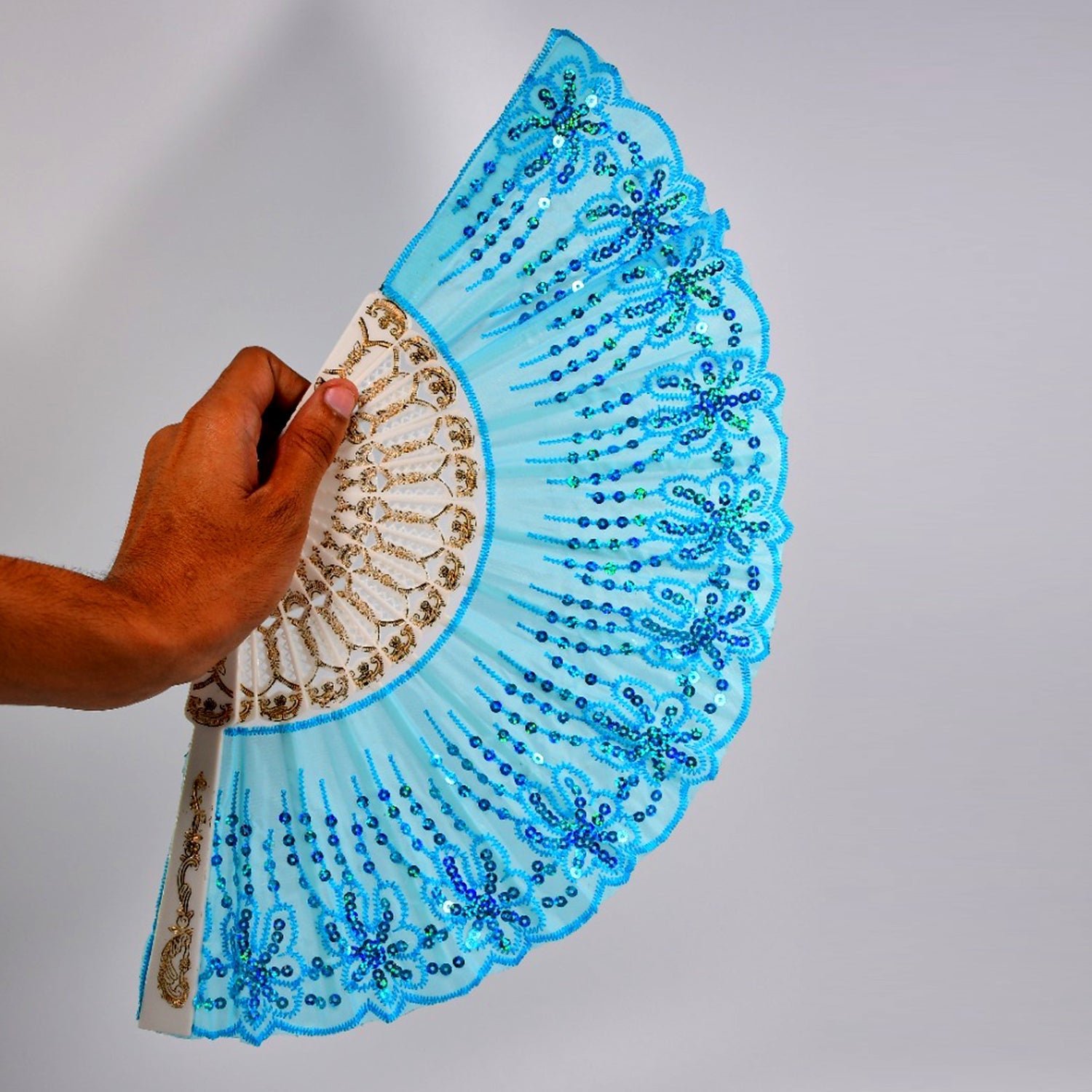 Chinese vintage folding fan with floral designs, ideal for decoration and cooling. Comes with a protective fabric sleeve.