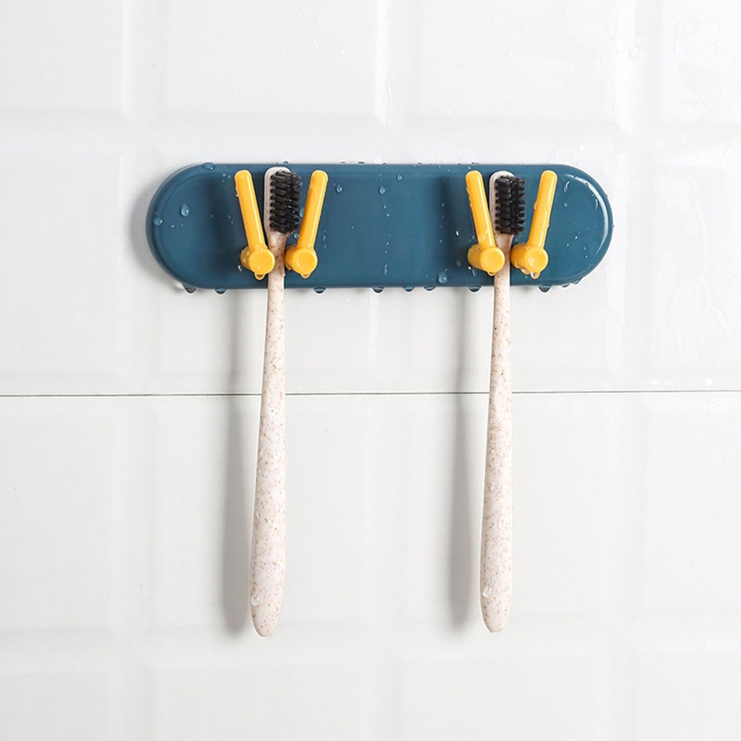 Plastic organizer with hooks, wall-mounted for bathroom and kitchen accessories.