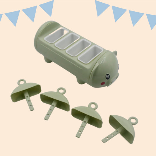 Pig-shaped ice candy mold with four cups for making popsicles.