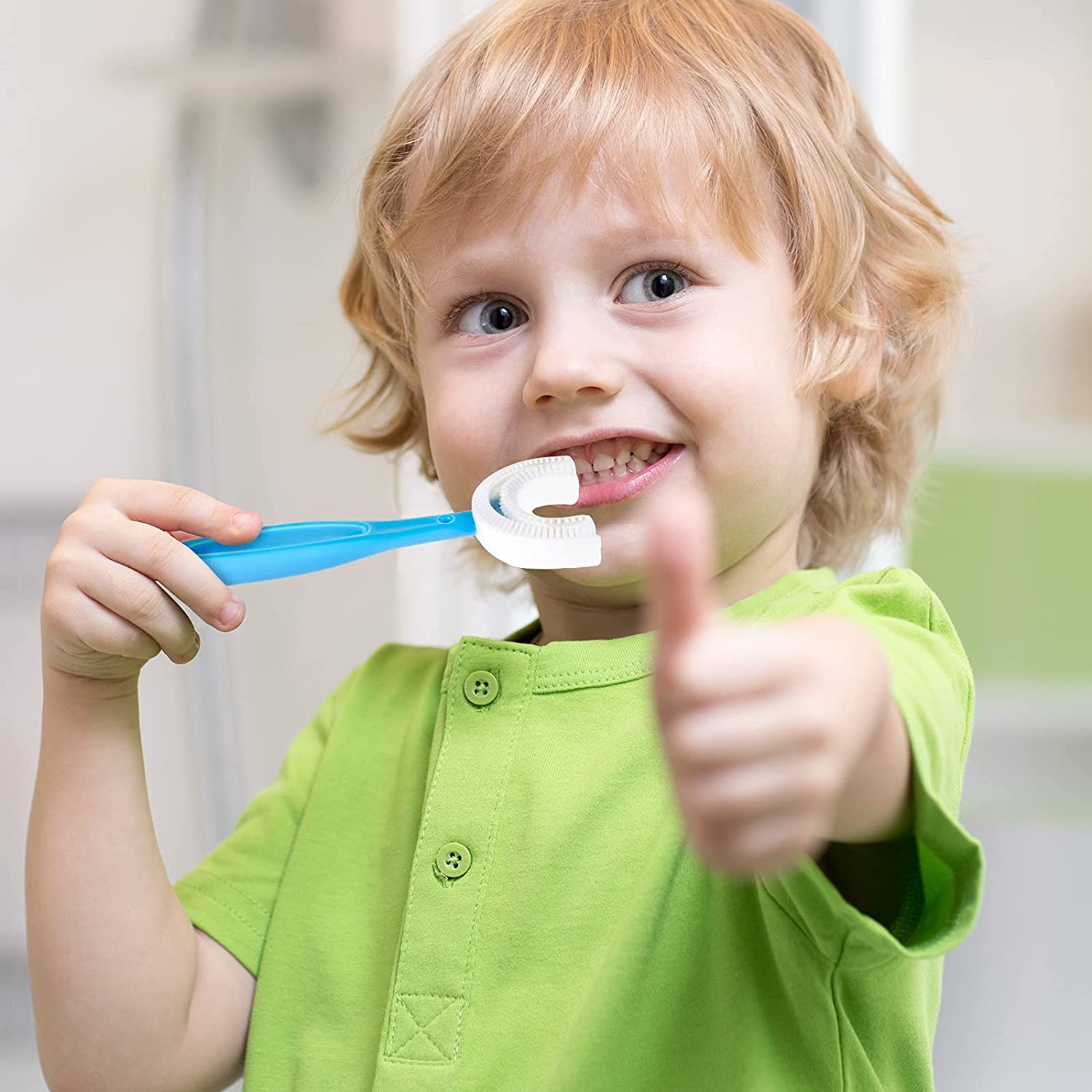 Kids' toothbrush with U shape for effective brushing