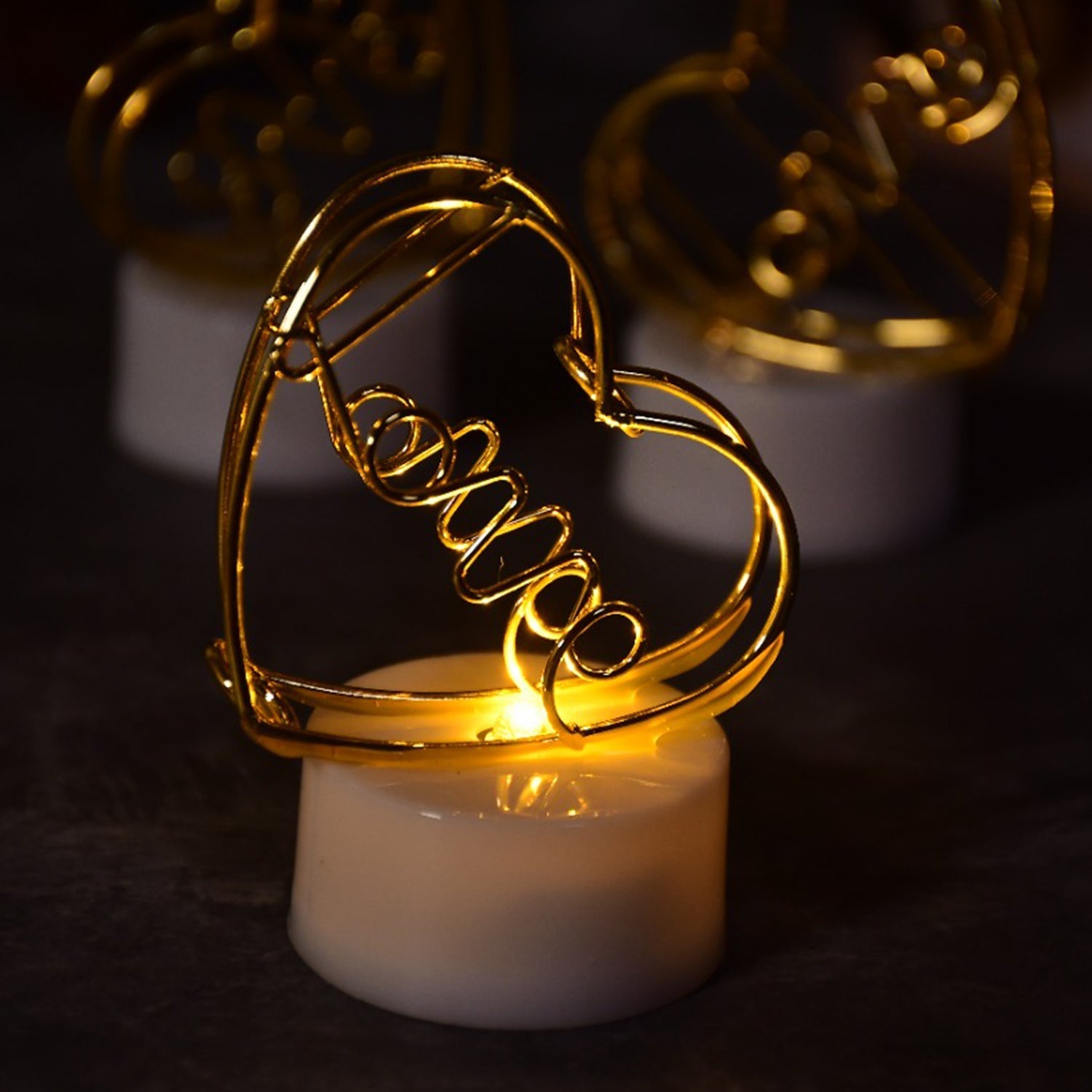 Multicolor flameless heart candles for decor.