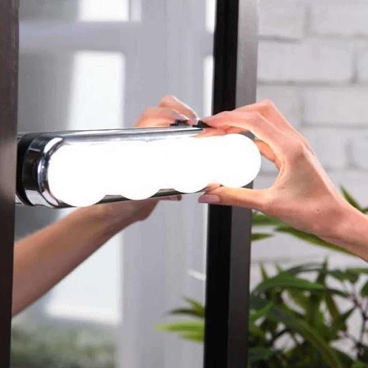 Side view of bright LED makeup mirror