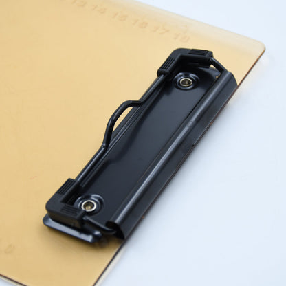 Transparent heavy-duty clipboard, durable plastic for professional use and organization.