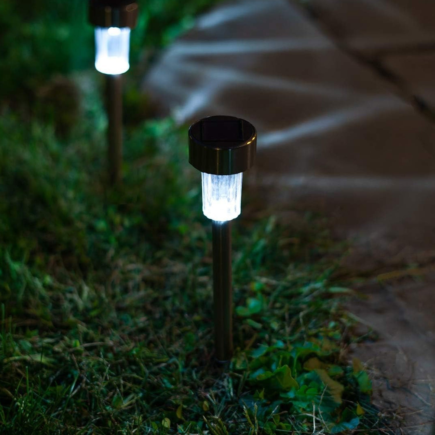 Functional LED solar spike light for brightening garden and walkway.