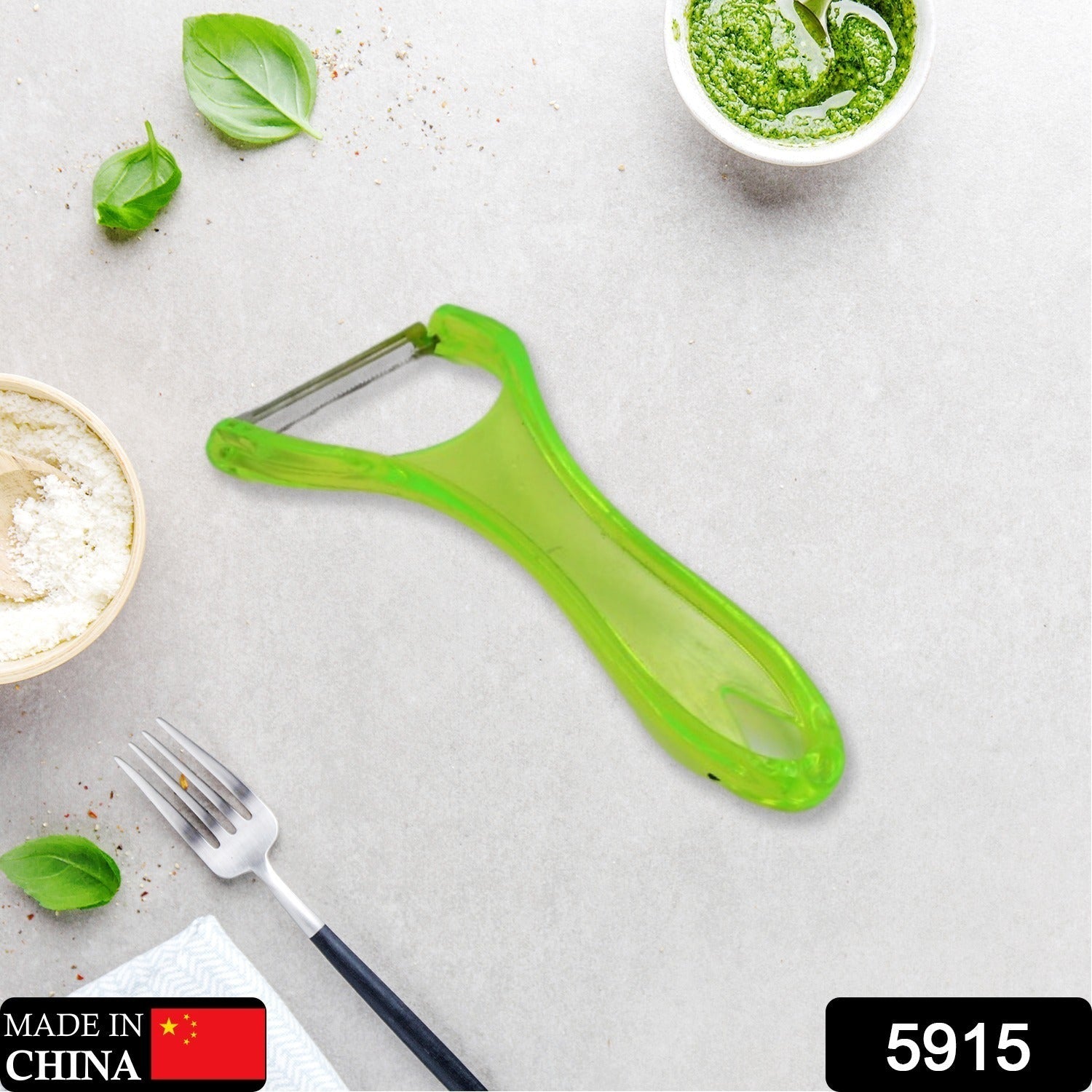 Professional peeler with stainless steel blade for versatile kitchen tasks.