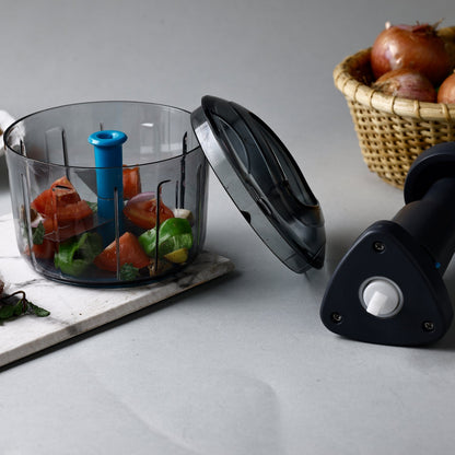 Push chopper with lock feature, ideal for kitchen use