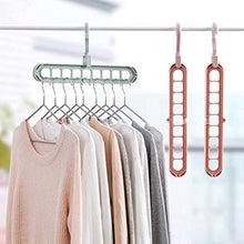 Set of nine-hole anti-skid plastic wardrobe hangers.