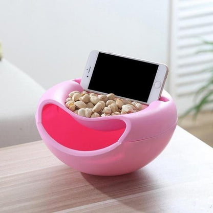 Fruit platter with phone holder, designed for convenient snacking and entertainment.