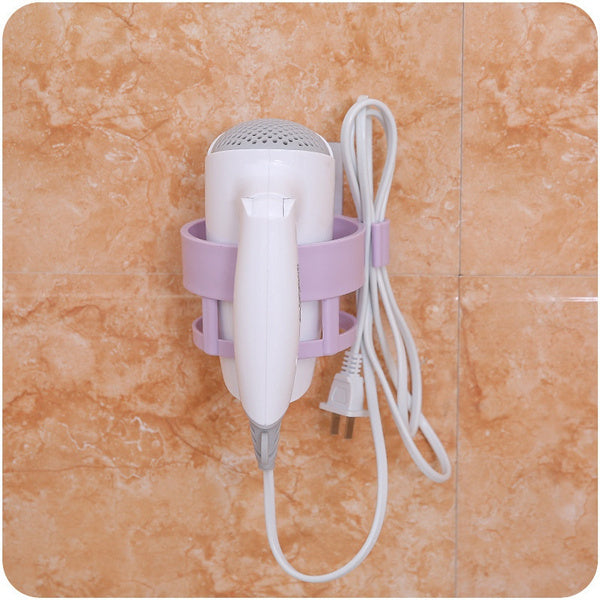 Hair dryer holder on wall