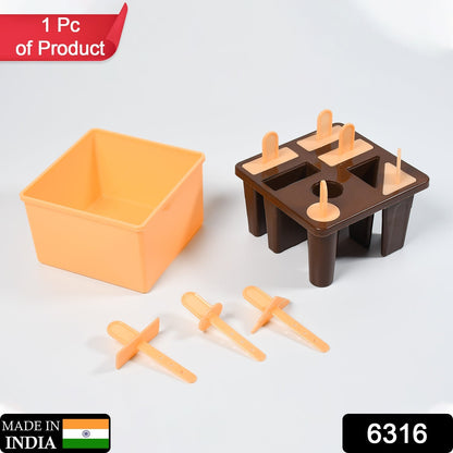 Reusable pink kulfi mold with popsicle sticks