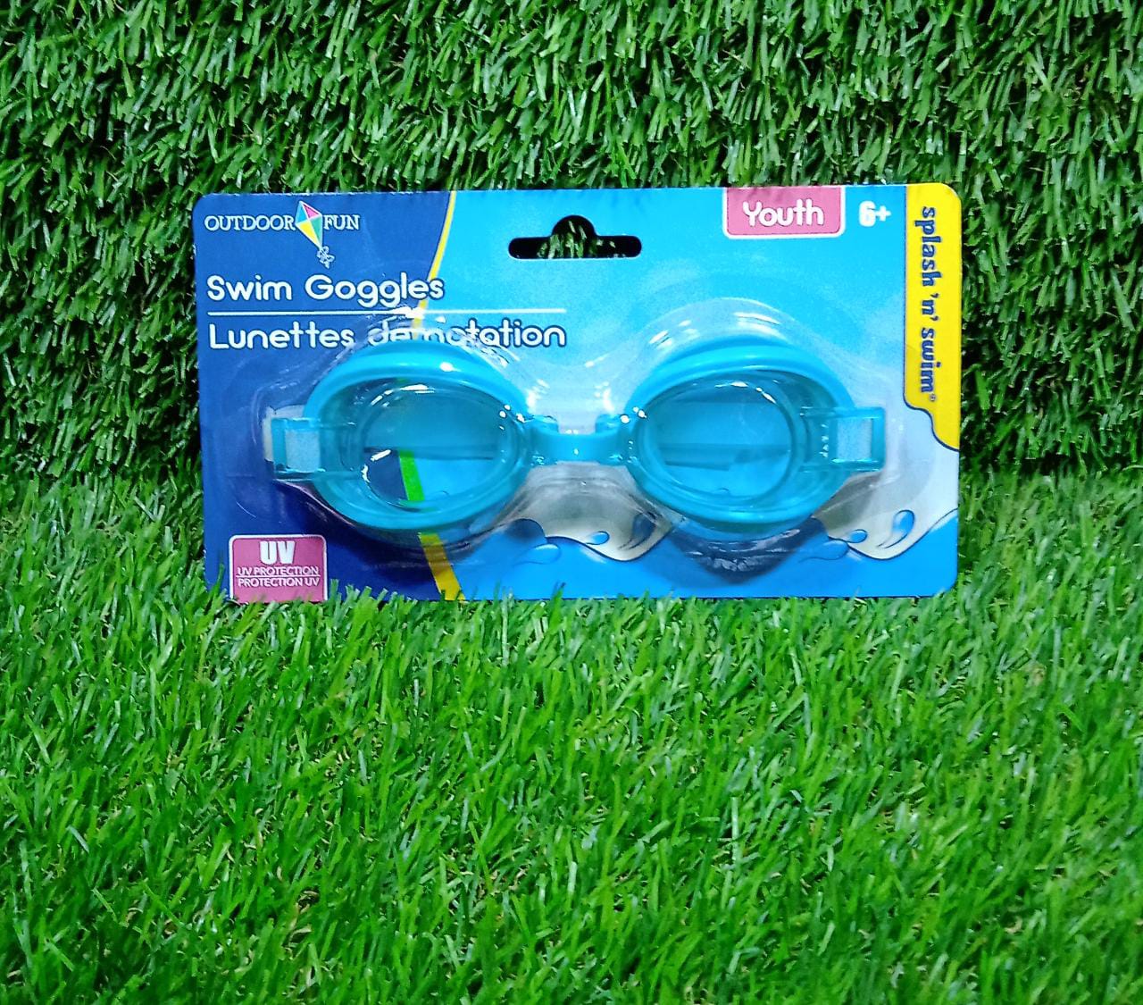 Swimming goggles with adjustable strap and clear anti-fog lenses