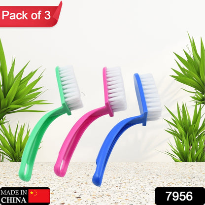 Three-piece set of cleaning brushes for fruits and vegetables.