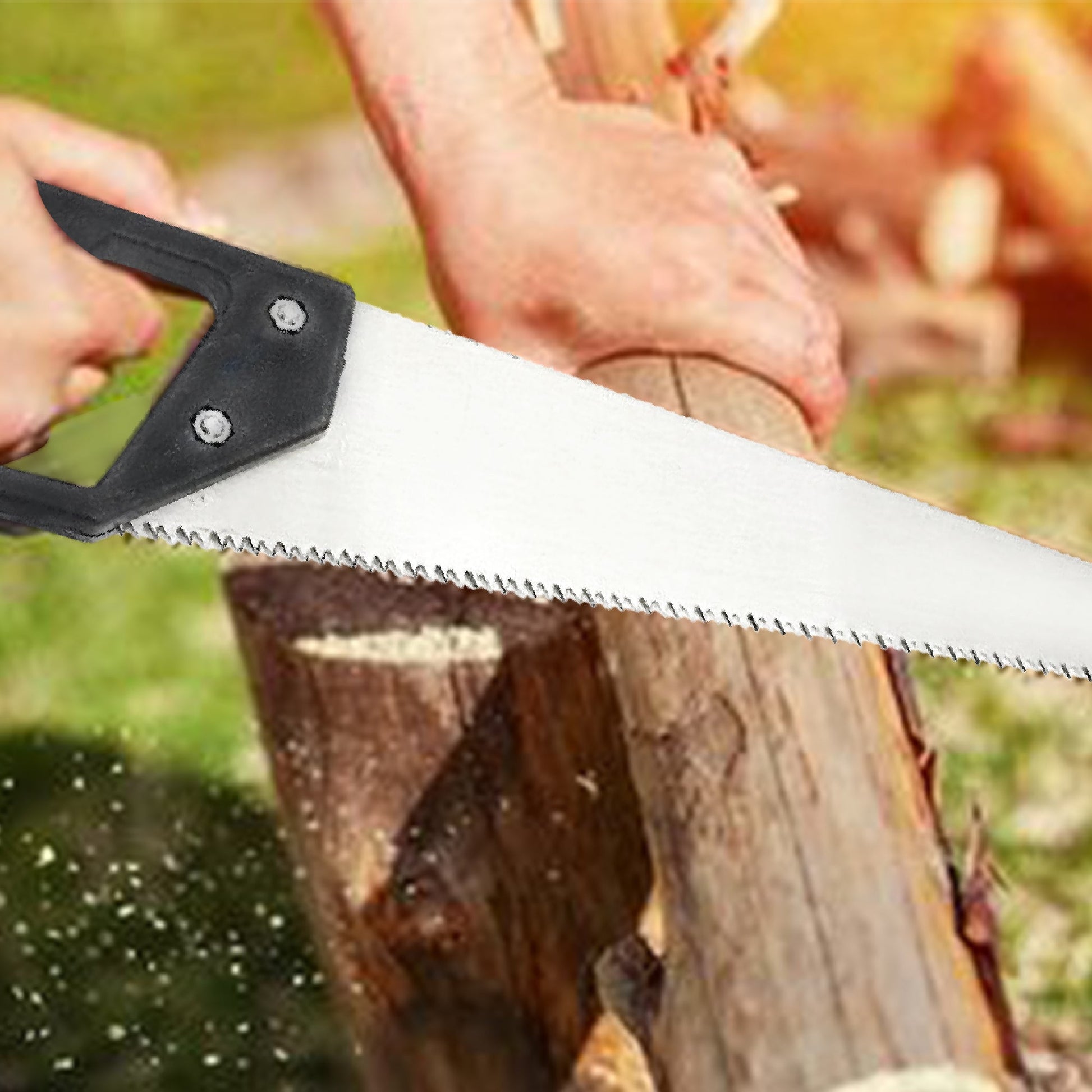 Close-up of hand saw with hardened steel blades.